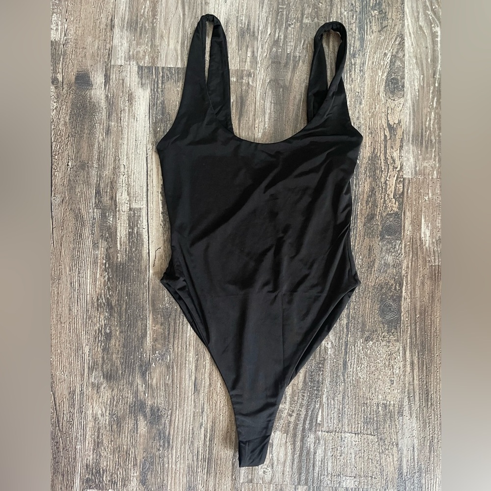 Naked Wardrobe swim, black one piece, NWT, size small